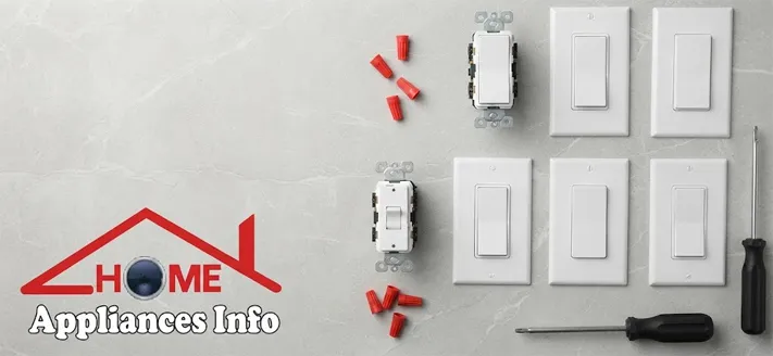Flat lay of several white in-wall smart dimmer switches in paddle, rocker and push-button styles on a gray surface